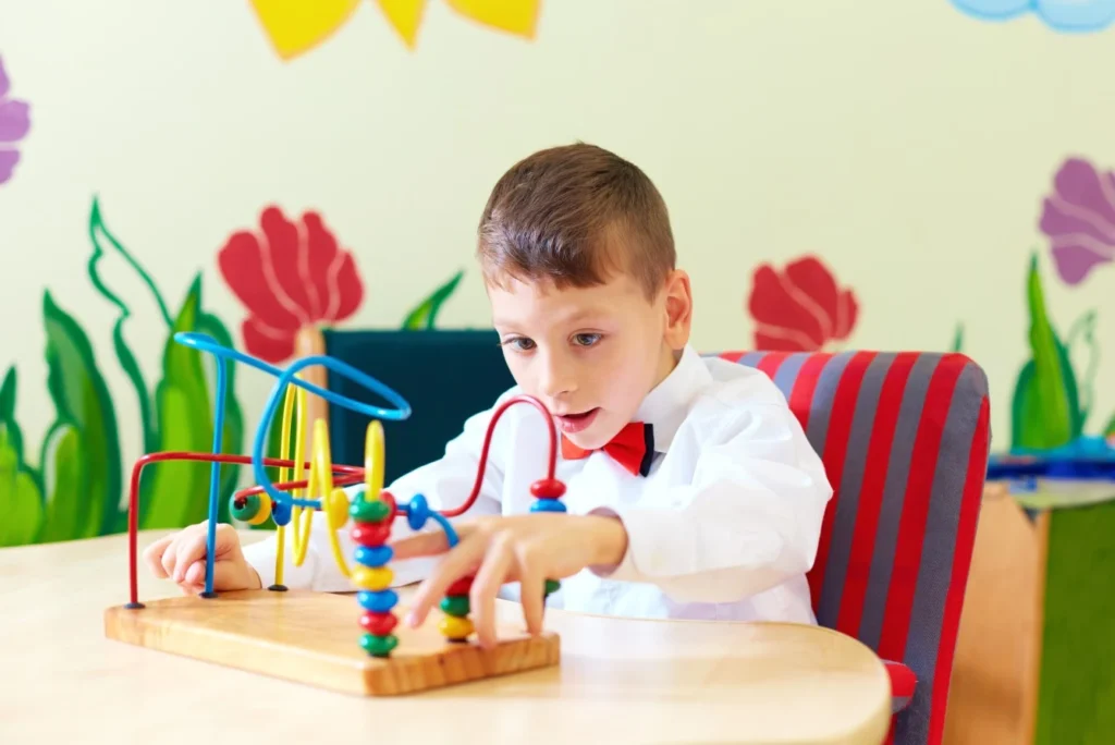 Young disabled child playing